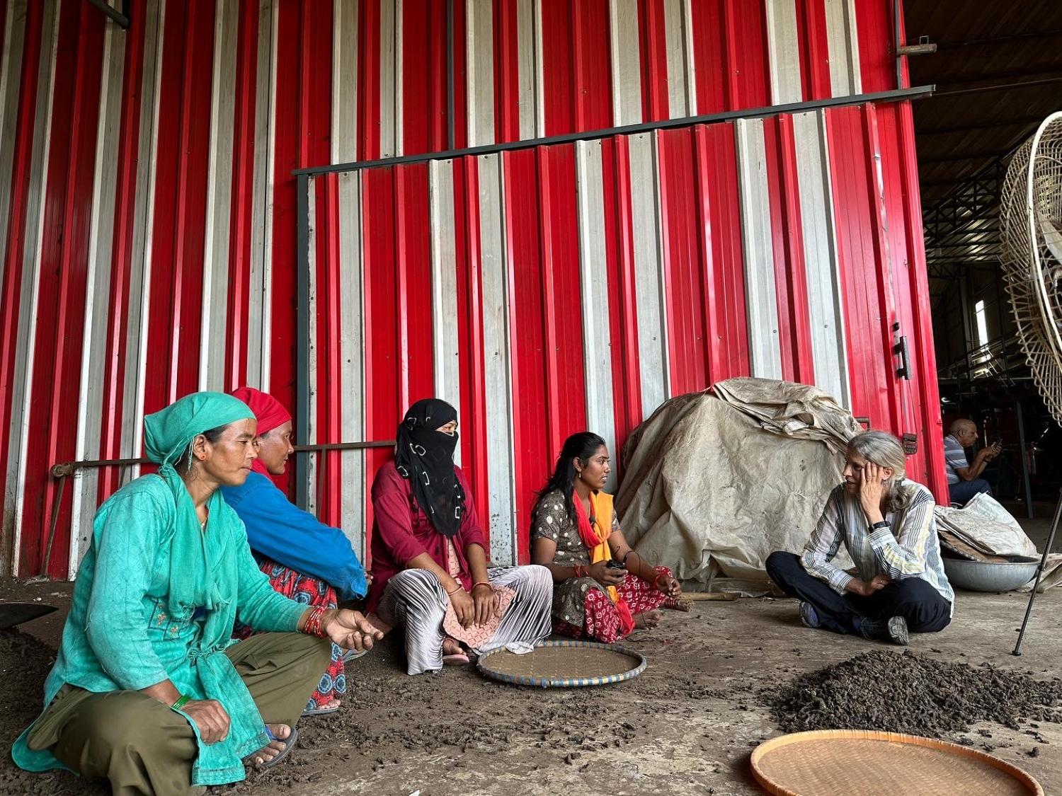 Ann Armbrecht interviewing employees at Nepal Ganj processing center